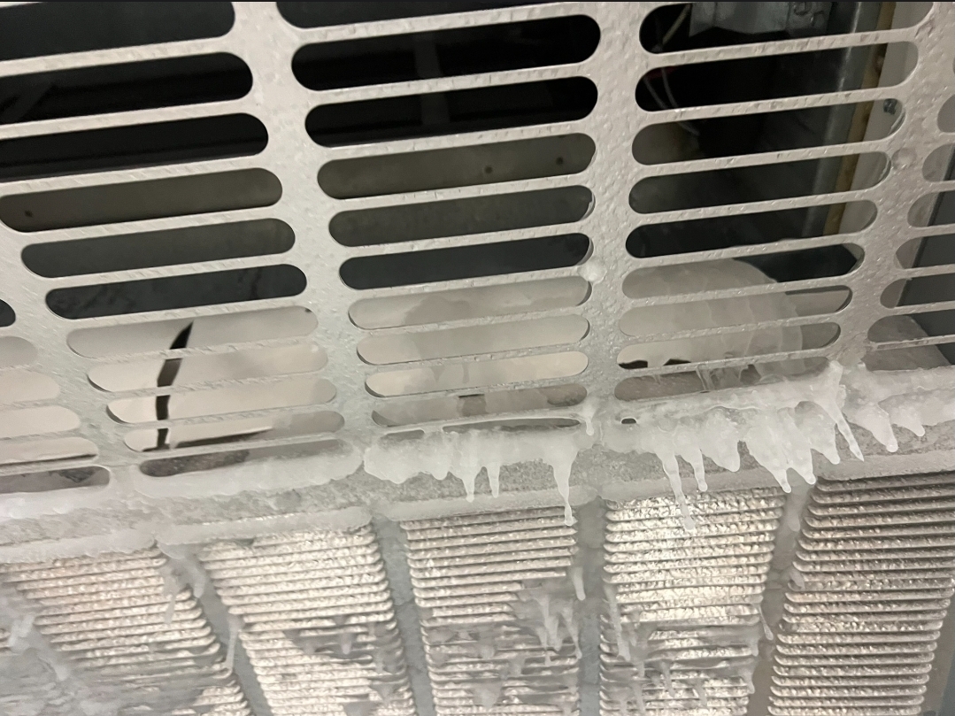 Frozen evaporator coils with heavy ice formation