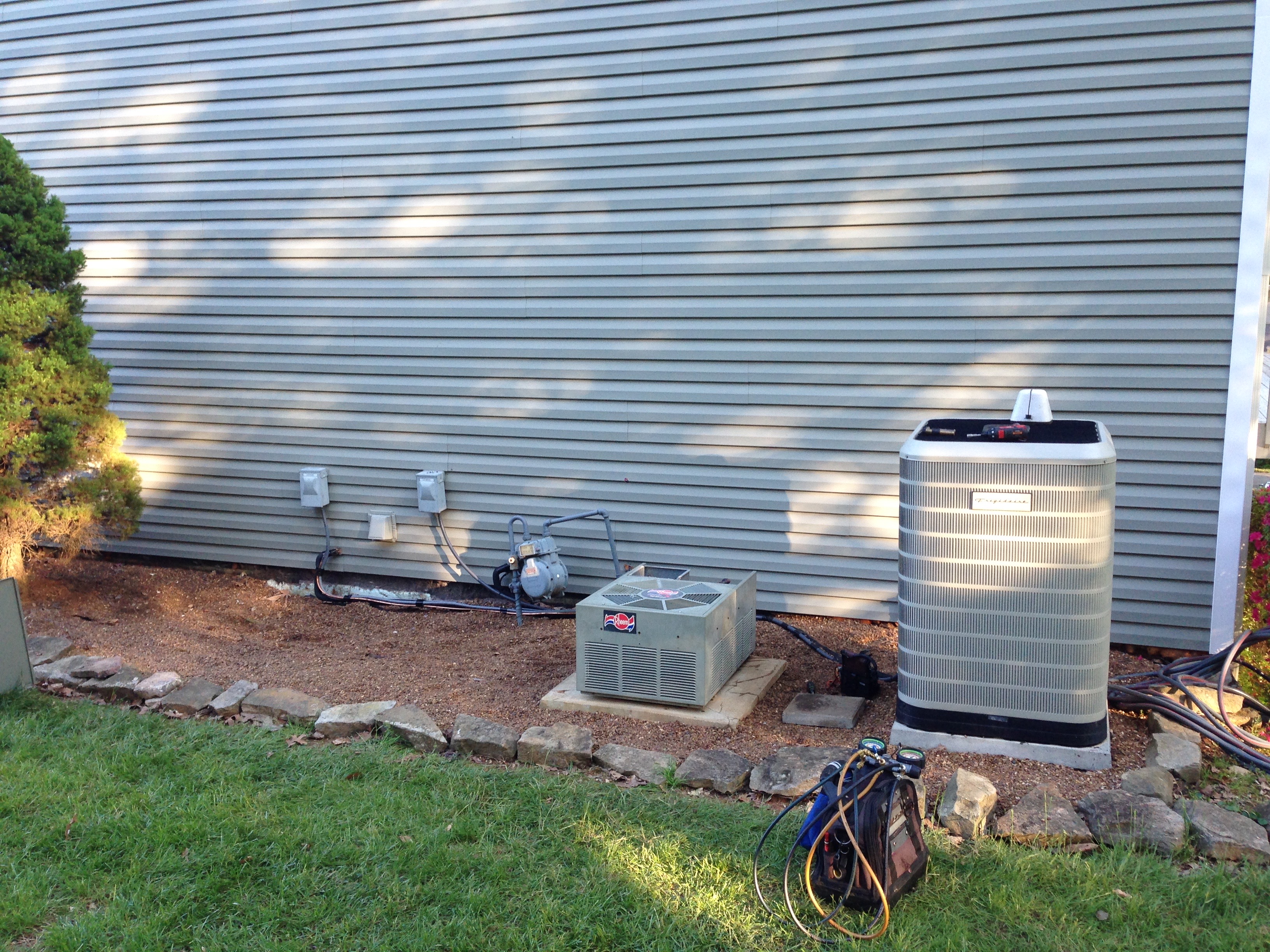Residential HVAC system installation with outdoor units